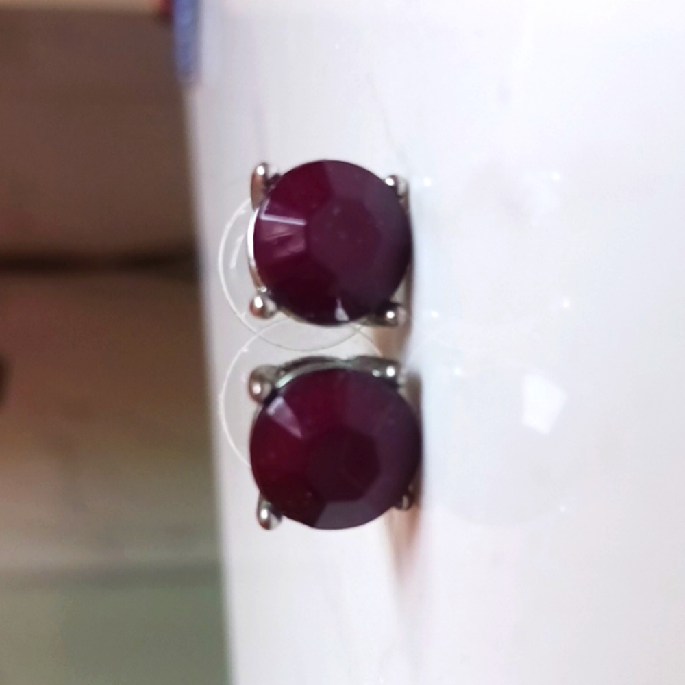 Large studs in silver setting